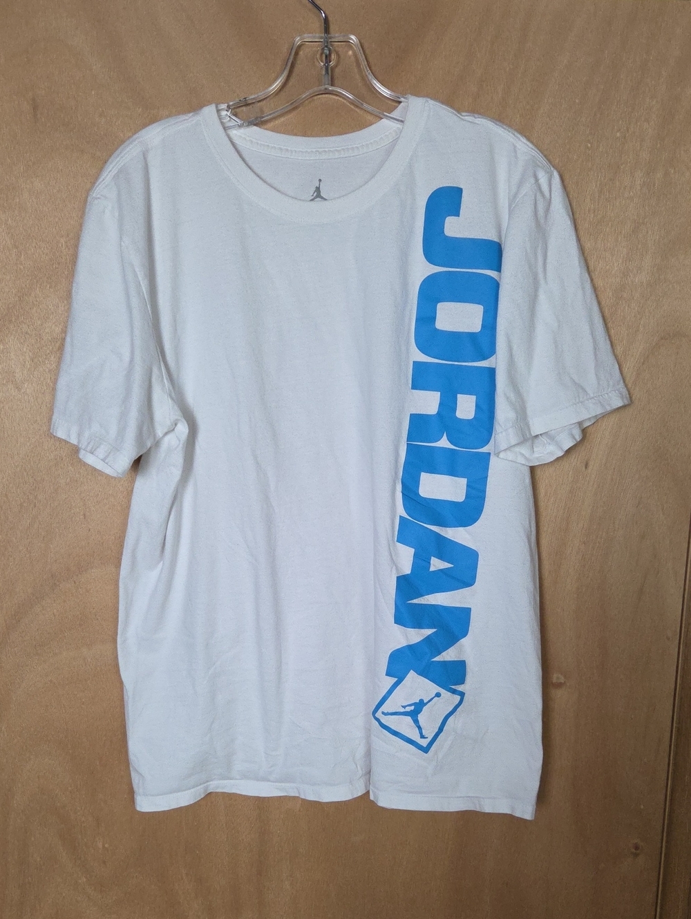 Jordan White Short-Sleeve Tee with Blue Vertical Logo